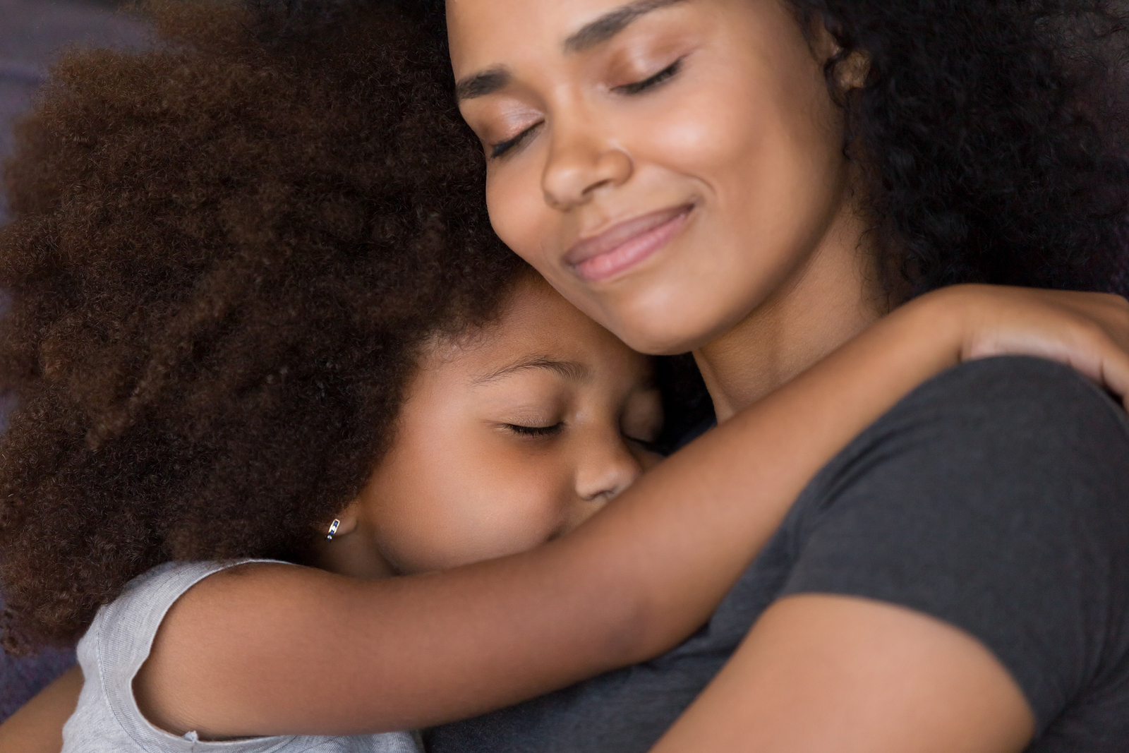 Loving Single Black Mother Hugs Cute Daughter Feel Tenderness Co